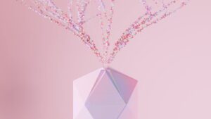 A modern abstract geometric vase with a colorful particle explosion on a pink background.